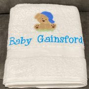 Puppy with hat personalised towel